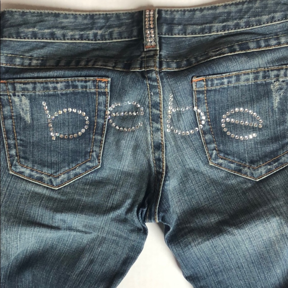 Bebe belt bottom jeans.